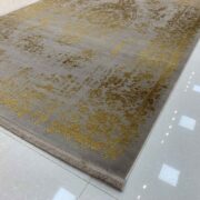 فرش مدرن و فانتزی ماشینی گل برجسته زمینه طوسی طلایی وینتیج کد 34-143
